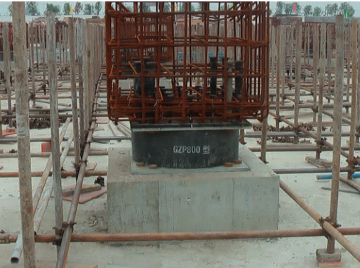 Design and Structural Requirements for the Seismic Isolation Layer in Base-Isolated Buildings